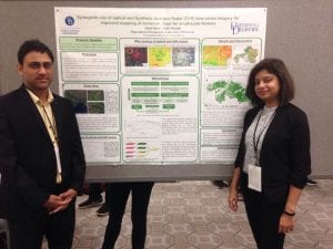 Photo of Abdul Qadir and Pinki Mondal at the American Association of Geographers Conference in Washington, DC.